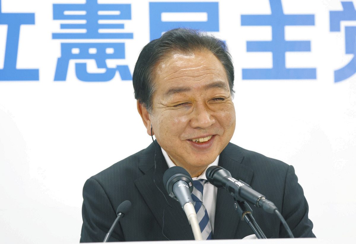 Democratic Party of Japan representative Yoshihiko Noda smiles during a press conference at the party's headquarters in Nagatacho, Tokyo on October 27 (Photo by Tetsuya Futo)