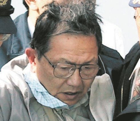 現金輸送車襲撃事件で取り押さえられた中村泰受刑者＝2002年11月、名古屋市で