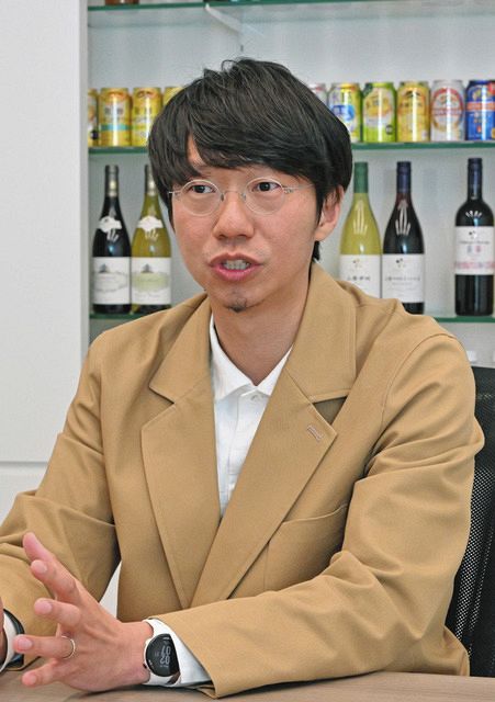 自社メディアの効果や意義について語る平山高敏さん＝東京都中野区で