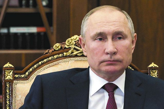 ２０日、モスクワで、会合に出席するプーチン大統領＝ＡＰ