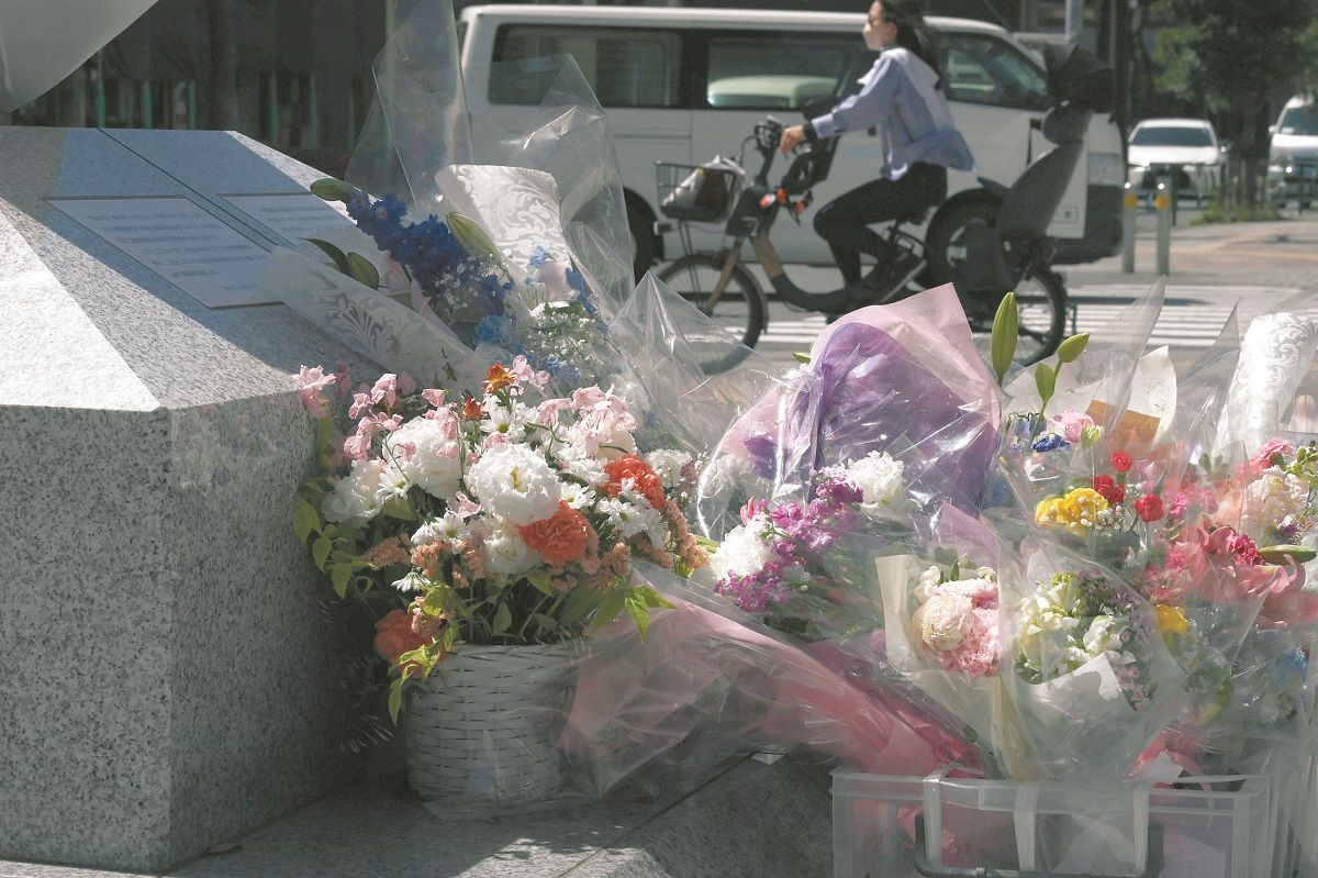 Bouquets of flowers gathered near a cenotaph near the accident site ============================= 19th, Toshima Ward , Tokyo, in Toshima Ward, Tokyo)