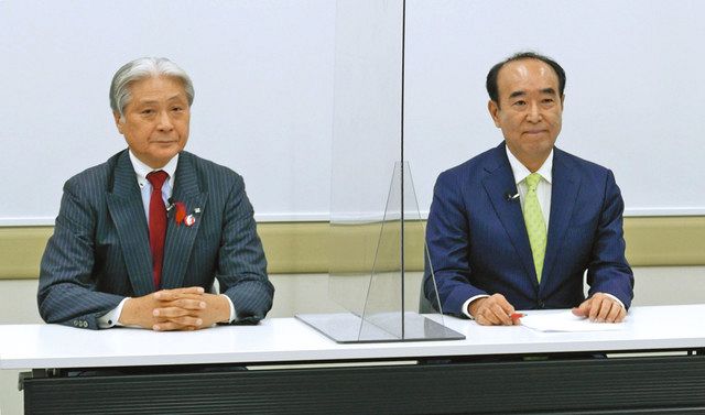 討論番組で論戦を交わした福田さん（左）と田野辺さん＝宇都宮市で