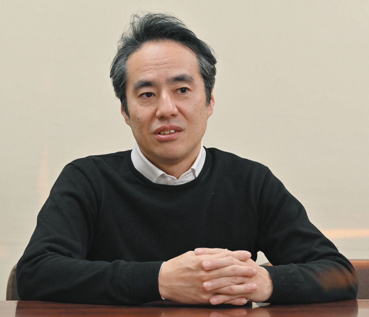 裏金問題について話す駒沢大の富崎隆教授