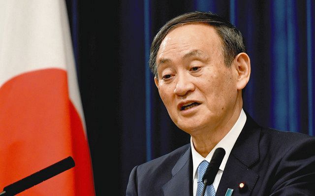 ４日、年頭の記者会見で質問に答える菅首相